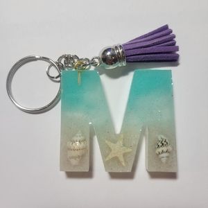 Initial M beach themed key chain.